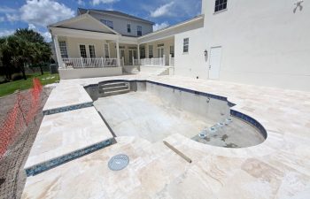 https://www.ftlauderdale-poolservice.com/wp-content/uploads/2024/12/winter-swimming-pool-construction-85744016-350x225.jpg